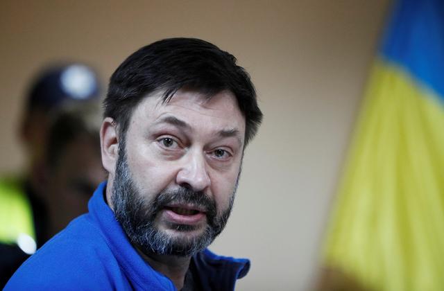 FILE PHOTO - Kirill Vyshinsky, director of the Ukrainian office of the Russian state news agency RIA Novosti, who was detained by Security Service of Ukraine on treason charges in 2018, speaks during a court hearing in Kiev, Ukraine July 19, 2019. REUTERS/Valentyn Ogirenko