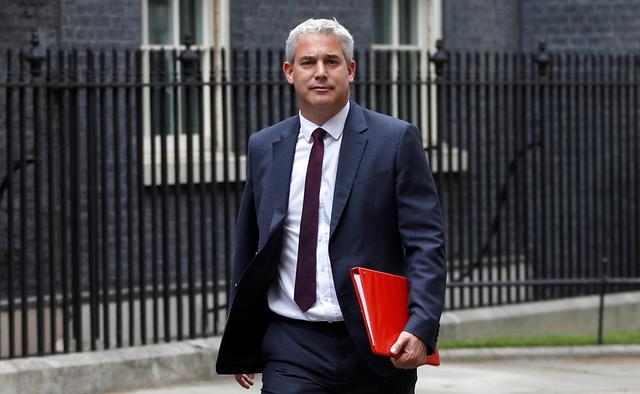 FILE PHOTO: Britain's Secretary of State for Exiting the European Union Stephen Barclay walks at Downing Street in London, Britain, August 13, 2019. REUTERS/Peter Nicholls