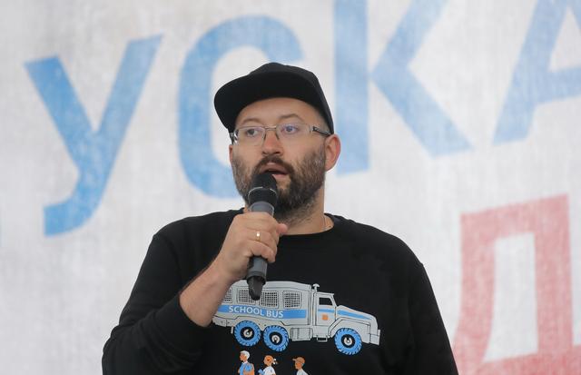 FILE PHOTO: Russian journalist Ilya Azar delivers a speech during a rally to demand authorities allow opposition candidates to run in the upcoming local election in Moscow, Russia August 10, 2019. REUTERS/Maxim Shemetov/File Photo