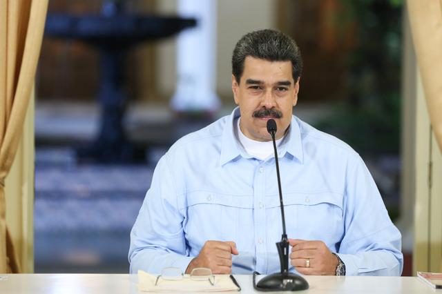 FILE PHOTO: Venezuela's President Nicolas Maduro takes part in a meeting with members of the government at Miraflores Palace in Caracas, Venezuela July 25, 2019. Miraflores Palace/Handout via REUTERS 