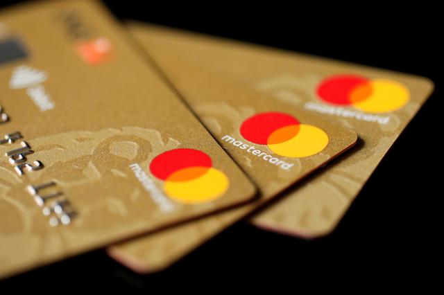 FILE PHOTO: Mastercard Inc. credit cards are displayed in this picture illustration taken December 8, 2017. REUTERS/Benoit Tessier/Illustration