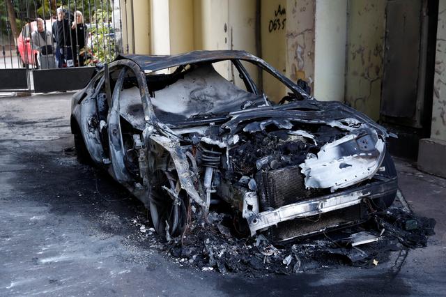 A view shows a burnt car, which is reportedly owned by former Governor of the Ukrainian Central Bank Valeria Gontareva's family members, in Kiev, Ukraine September 5, 2019. REUTERS/Valentyn Ogirenko