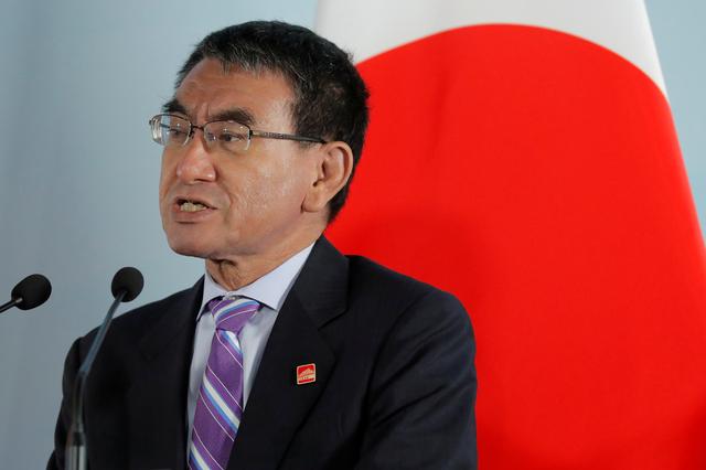 FILE PHOTO: Japanese Foreign Minister Taro Kono speaks beside South Korean Foreign Minister Kang Kyung-wha (not pictured) and Chinese Foreign Minister Wang Yi (not pictured) during a press conference after the ninth trilateral foreign ministers’ meeting among China, South Korea and Japan at Gubei Town in Beijing, China, 21 August 2019. Wu Hong/Pool via REUTERS