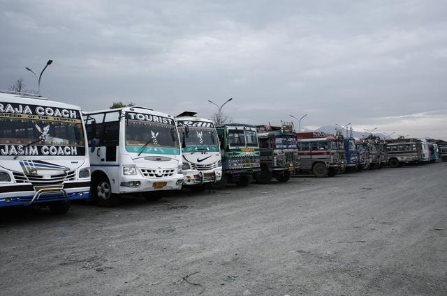 FILE PHOTO: Buses are parked at a bus station during restrictions, after scrapping of the special constitutional status for Kashmir by the Indian government, in Srinagar, August 26, 2019. REUTERS/Adnan Abidi