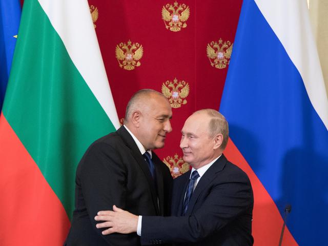 FILE PHOTO: Russian President Vladimir Putin and Bulgarian Prime Minister Boyko Borissov hug each other after a joint news conference following their talks at the Kremlin in Moscow, Russia May 30, 2018. Pavel Golovkin/Pool via REUTERS/File Photo