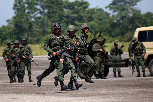 FILE PHOTO: Members of the National Guard take part in a military exercise in Garcia Hevia airport in La Fria, Venezuela September 10, 2019. REUTERS/Carlos Eduardo Ramirez