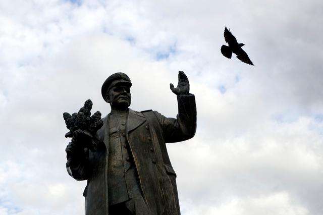 A bird flies past the monument of Soviet World War II commander Ivan Stepanovic Konev in Prague, Czech Republic, September 12, 2019.  REUTERS/David W Cerny