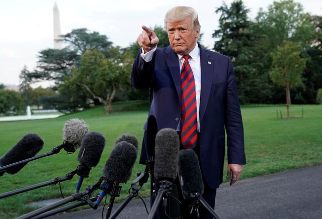 U.S. President Donald Trump speaks to reporters as he departs for Baltimore, Maryland from the South Lawn of the White House in Washington U.S., September 12, 2019. REUTERS/Kevin Lamarque