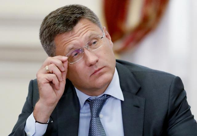 FILE PHOTO: Russian Energy Minister Alexander Novak adjusts glasses during a meeting chaired by Prime Minister Dmitry Medvedev in Astrakhan, Russia August 30, 2019. Sputnik/Dmitry Astakhov/Pool via REUTERS