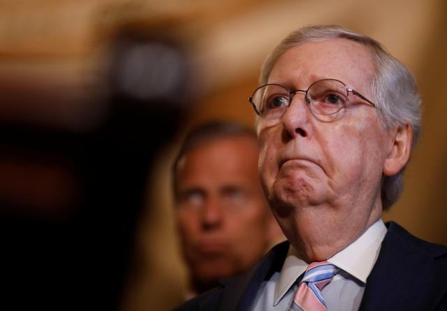 FILE PHOTO: U.S. Senate Majority Leader Mitch McConnell (R-KY) addresses reporters after the weekly senate party caucus luncheons at the U.S. Capitol in Washington, U.S., July 23, 2019. REUTERS/Eric Thayer
