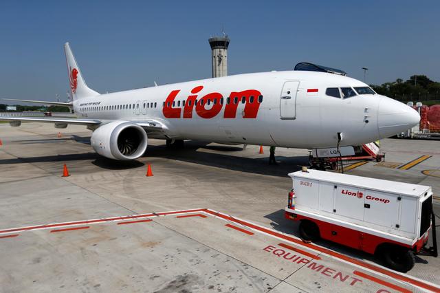 FILE PHOTO: Lion Air's Boeing 737 Max 8 airplane is parked on the tarmac of Soekarno Hatta International airport near Jakarta, Indonesia, March 15, 2019. REUTERS/Willy Kurniawan