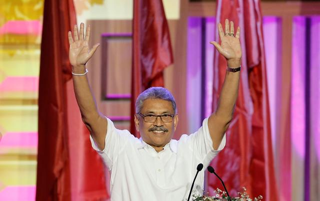 FILE PHOTO: Sri Lanka's former defense secretary Gotabaya Rajapaksa waves after he was nominated as a presidential candidate during the Sri Lanka People's Front party convention in Colombo, Sri Lanka August 11, 2019. REUTERS/Dinuka Liyanawatte/File Photo