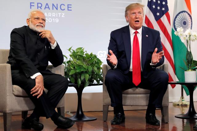 FILE PHOTO: U.S. President Donald Trump speaks as he meets Indian Prime Minister Narendra Modi for bilateral talks during the G7 summit in Biarritz, France, August 26, 2019. REUTERS/Carlos Barria/File Photo