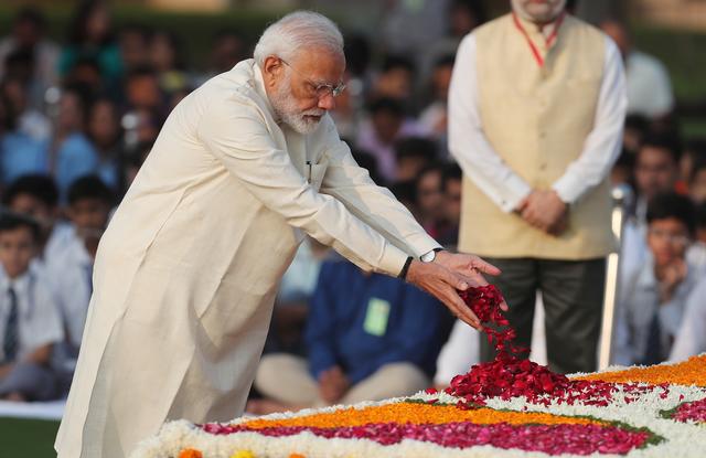 India's Prime Minister Narendra Modi pays homage at the Mahatma Gandhi memorial on the 150th birth anniversary of Gandhi at Rajghat in New Delhi, India, October 2, 2019. REUTERS/Adnan Abidi