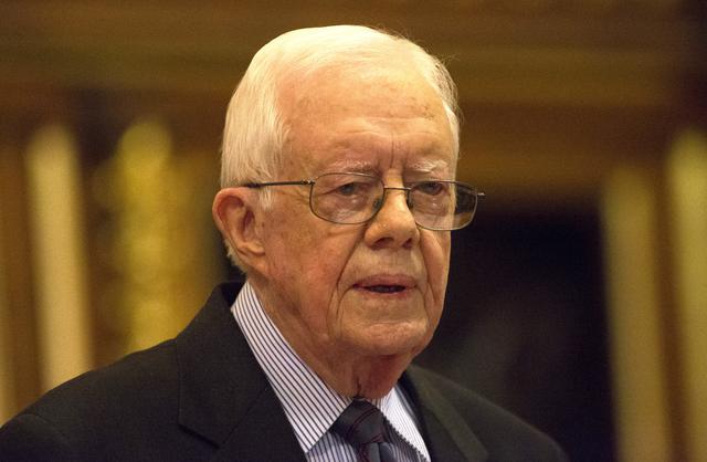 FILE PHOTO: Former U.S. President Jimmy Carter delivers a lecture on the eradication of the Guinea worm, at the House of Lords in London, Britain February 3, 2016. REUTERS/Neil Hall