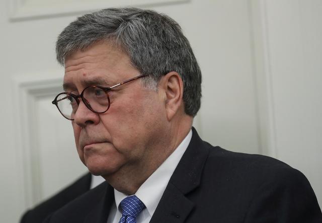 U.S. Attorney General William Barr attends a Presidential Medal of Freedom ceremony in honor of former Attorney General Edwin Meese in the Oval Office of the White House in Washington, October 8, 2019.  REUTERS/Leah Millis
