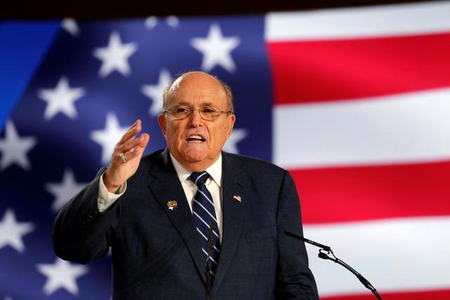 FILE PHOTO: Rudy Giuliani, former Mayor of New York City, speaks at an event in Ashraf-3 camp, which is a base for the People's Mojahedin Organization of Iran (MEK) in Manza, Albania, July 13, 2019.REUTERS/Florion Goga