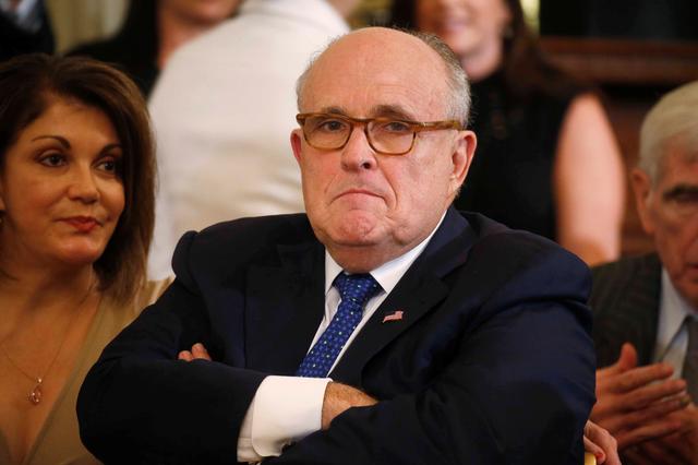 FILE PHOTO: Rudy Giuliani is seen ahead of U.S. President Donald Trump introducing his Supreme Court nominee in the East Room of the White House in Washington, U.S., July 9, 2018. REUTERS/Leah Millis