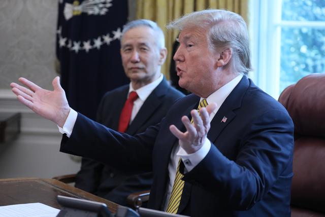 FILE PHOTO: U.S. President Donald Trump speaks while meeting with China's Vice Premier Liu He in the Oval Office of the White House in Washington, U.S., April 4, 2019. REUTERS/Jonathan Ernst/File Photo