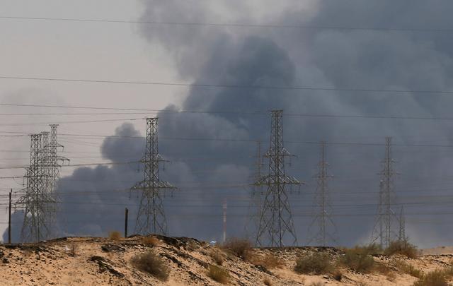FILE PHOTO: Smoke is seen following a fire at an Aramco factory in Abqaiq, Saudi Arabia, September 14, 2019. REUTERS/Stringer