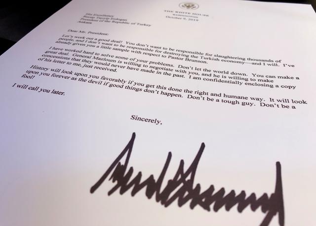 An October 9 letter from U.S. President Donald Trump to Turkey's President Tayyip Erdogan warning Erdogan about Turkish military policy and the Kurdish people in Syria is seen after being released by the White House in Washington, U.S. October 16, 2019.  REUTERS/Jim Bourg
