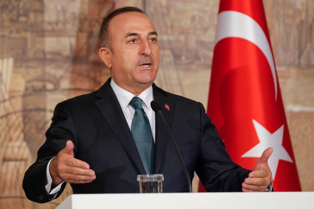 FILE PHOTO: Turkish Foreign Minister Mevlut Cavusoglu attends a news conference in Istanbul, Turkey, October 11, 2019. REUTERS/Huseyin Aldemir