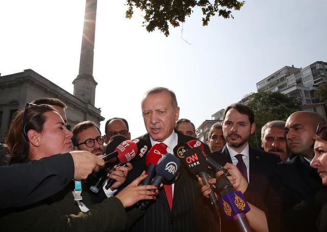 Turkish President Tayyip Erdogan talks to media as he leaves from a mosque after the Friday prayers in Istanbul, Turkey, October 18, 2019. Murat Kula/Presidential Press Office/Handout via REUTERS 