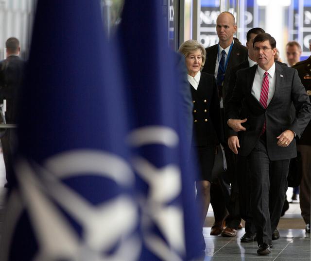 U.S. Secretary for Defense Mark Esper and U.S. Ambassador to NATO Kay Bailey Hutchison arrive for a meeting of NATO defense ministers at NATO headquarters in Brussels, Belgium October 24, 2019. Virginia Mayo/Pool via REUTERS