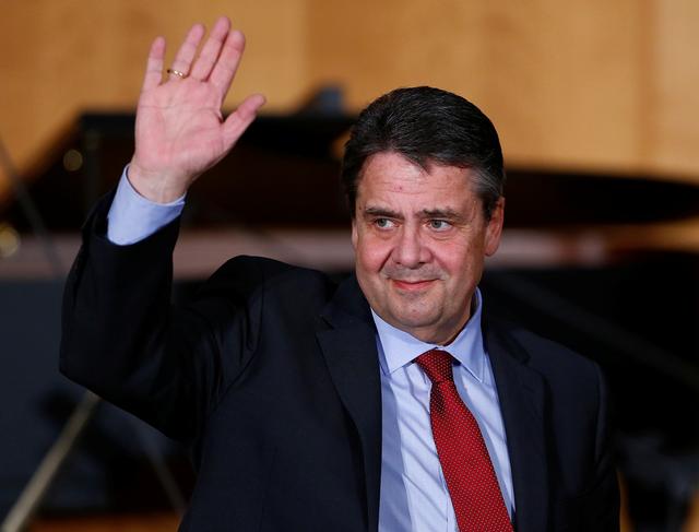 FILE PHOTO: Former German Foreign Minister Sigmar Gabriel waves at a ceremony in Berlin, Germany, March 14, 2018. REUTERS/Hannibal Hanschke/File Photo