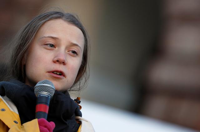 Climate change activist Greta Thunberg speaks during a Fridays for Future protest in Turin, Italy December 13, 2019. REUTERS/Guglielmo Mangiapane