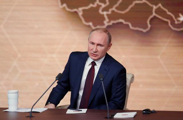 FILE PHOTO: Russian President Vladimir Putin attends his annual end-of-year news conference in Moscow, Russia December 19, 2019. REUTERS/Evgenia Novozhenina