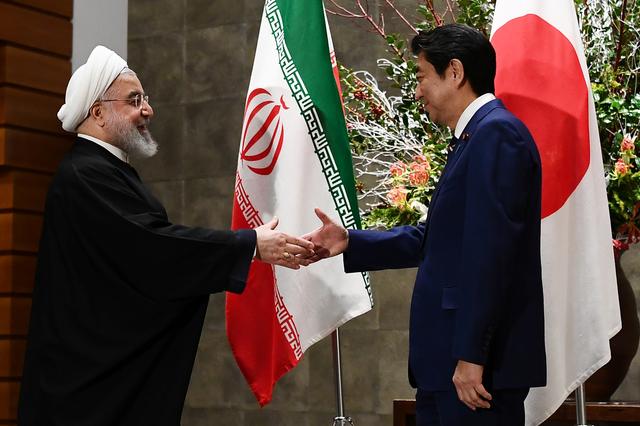 Japanese Prime Minister Shinzo Abe and Iranian President Hassan Rouhani meet in Tokyo, Japan, December 20, 2019. Charly Triballeau/Pool via REUTERS