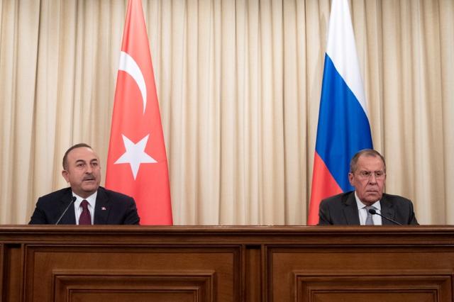Turkish Foreign Minister Mevlut Cavusoglu and Russian Foreign Minister Sergei Lavrov attend a joint news conference following their talks in Moscow, Russia January 13, 2020. Pavel Golovkin/Pool via REUTERS