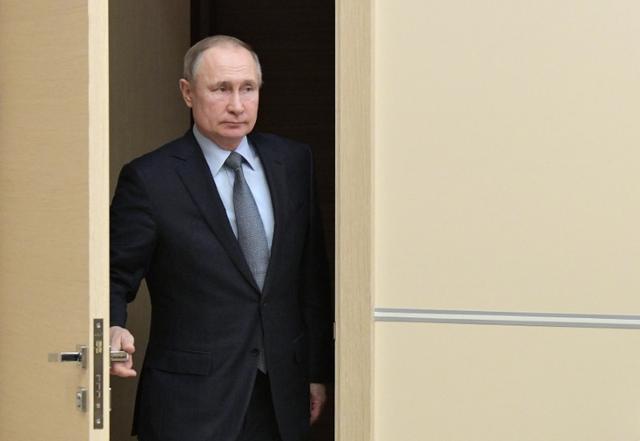 FILE PHOTO: Russian President Vladimir Putin arrives for a meeting with head of the Russian Direct Investment Fund Kirill Dmitriyev at the Novo-Ogaryovo state residence outside Moscow, Russia January 17, 2020. Sputnik/Aleksey Nikolskyi/Kremlin via REUTERS