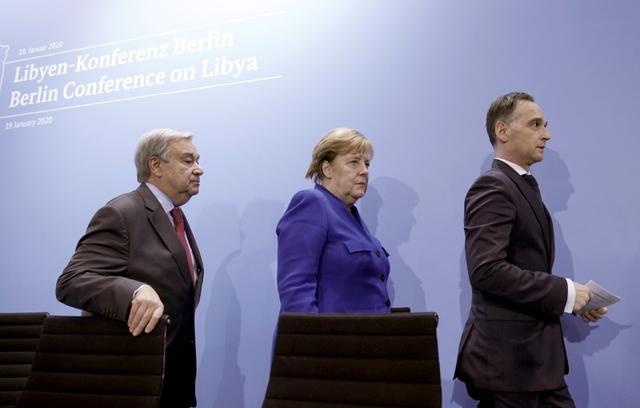 United Nations Secretary-General Antonio Guterres, Germany's Chancellor Angela Merkel and Germany's Foreign Minister Heiko Maas leave a news conference after the Libya summit in Berlin, Germany, January 19, 2020.  Michael Kappeler/Pool via Reuters