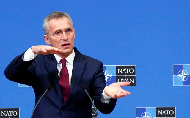 FILE PHOTO: NATO Secretary General Jens Stoltenberg gestures as he holds a news conference ahead of a NATO defence ministers meeting at the Alliance headquarters in Brussels, Belgium February 11, 2020. REUTERS/Francois Lenoir