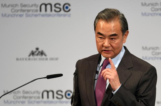 Chinese Foreign Minister Wang Yi gestures as he speaks at the annual Munich Security Conference in Germany February 15, 2020. REUTERS/Andreas Gebert