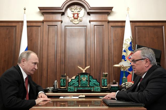Russian President Vladimir Putin meets with VTB bank Chief Executive Andrey Kostin at the Kremlin in Moscow, Russia March 16, 2020. Sputnik/Alexei Druzhinin/Kremlin via REUTERS ATTENTION EDITORS - THIS IMAGE WAS PROVIDED BY A THIRD PARTY.