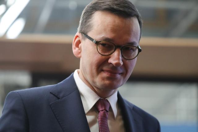 FILE PHOTO: Poland's Prime Minister Mateusz Morawiecki arrives for the second day of the European Union leaders summit, held to discuss the EU's long-term budget for 2021-2027, in Brussels, Belgium, February 21, 2020. Ludovic Marin/Pool via REUTERS
