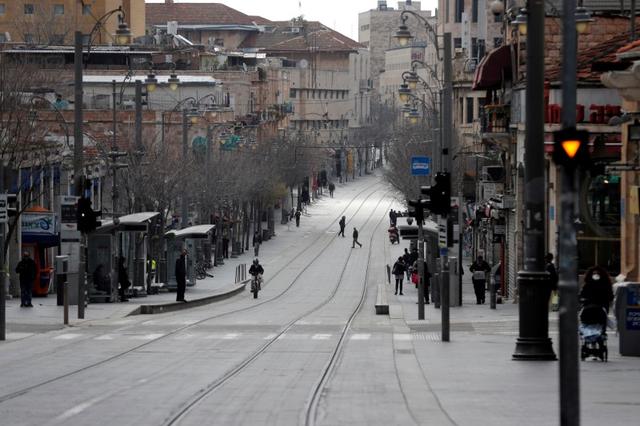 FILE PHOTO: A general view of a usually busy street is seen as Israel tightened a national stay-at-home policy following the spread of coronavirus disease (COVID-19) in Jerusalem March 22, 2020. REUTERS/Ronen Zvulun/File Photo