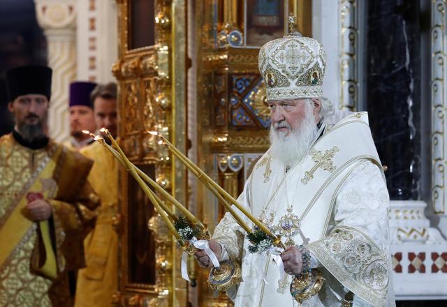FILE PHOTO: Patriarch Kirill of Moscow and All Russia conducts the Orthodox Christmas service at the Cathedral of Christ the Saviour in Moscow, Russia January 7, 2020. REUTERS/Evgenia Novozhenina
