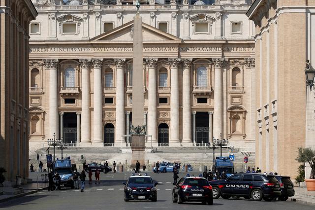 FILE PHOTO: Carabinieri military police patrol Saint Peter's square, before Pope Francis leads Palm Sunday mass without public participation due to the spread of coronavirus disease (COVID-19), at the Vatican, April 5, 2020. REUTERS/Remo Casilli