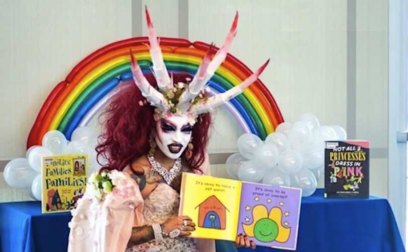 demon-transgender-reading-books-children.jpg